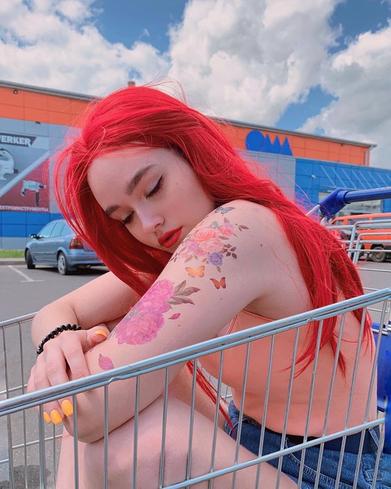 What’s behind red flower ? any guess